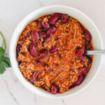 A bowl of kidney beans and ground beef.