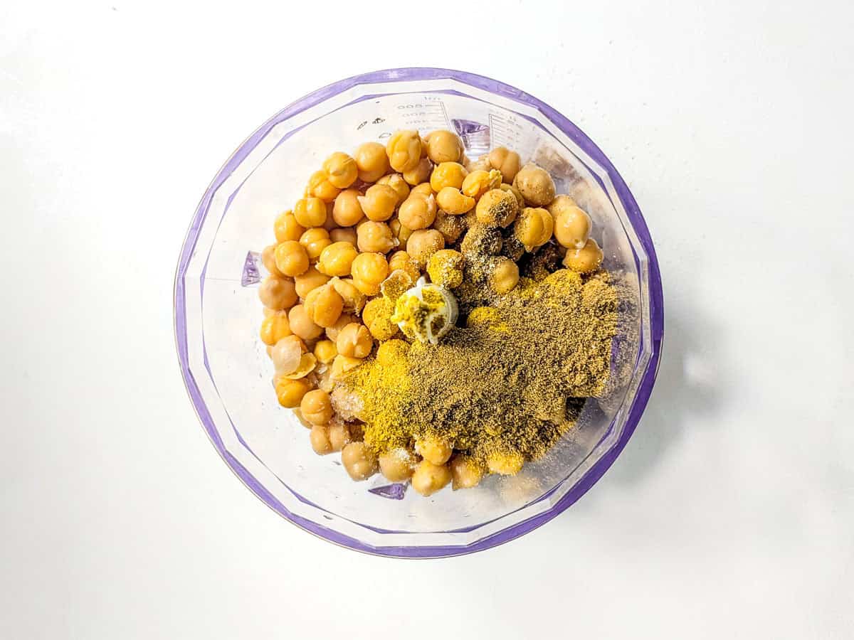 Hummus ingredients inside a food processor.