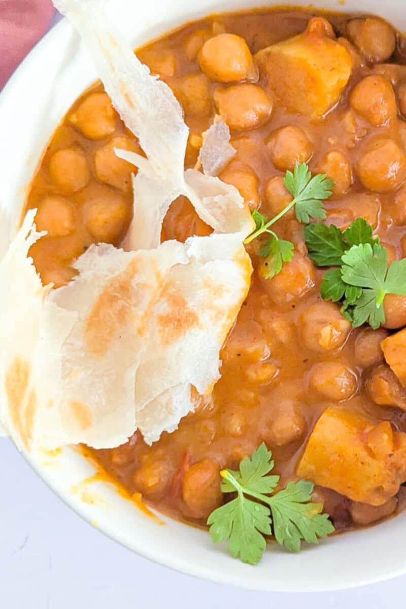 Chickpea and potato curry in a bowl.