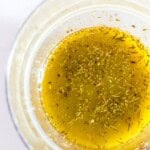 A bowl with Italian dressing.