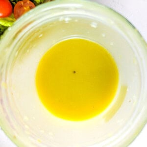 Top-down picture of lemon olive oil salad dressing.