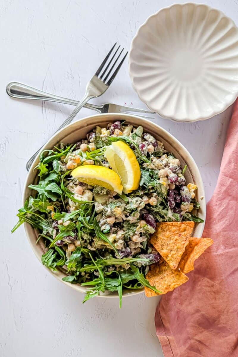 Chickpea tuna salad garnished with lemon slices.