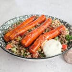 Buckwheat tabbouleh with roasted carrots and some yogurt on top.